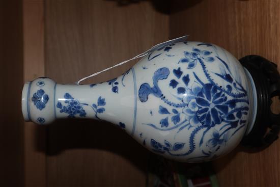 A Chinese Kangxi blue and white bottle vase, on hardwood stand vase excluding stand 23cm